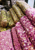 انرژی بار معجون درباری مغزچی مدل رول پسته و رول گل محمدی